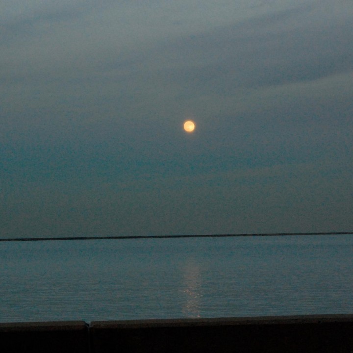 A bright moon over Lake Michigan
