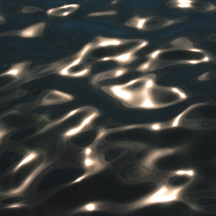 Sun glinting on water's surface