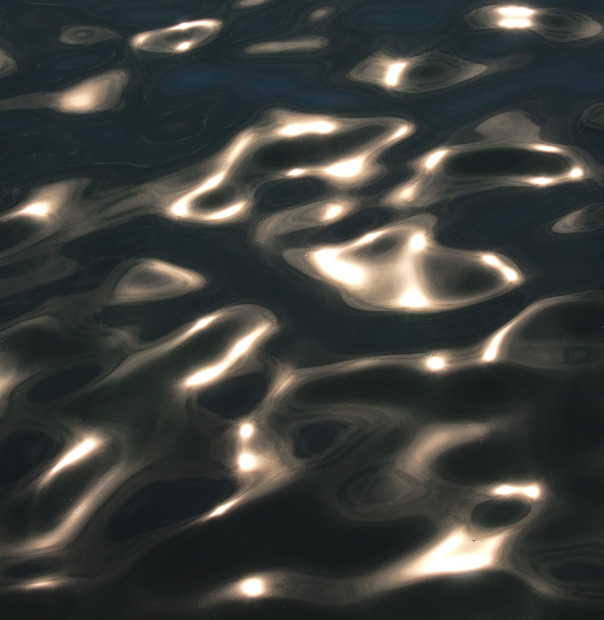 Sun glinting on water's surface