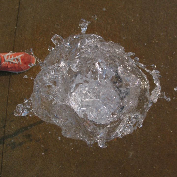 A burst of water coming up and at the viewer