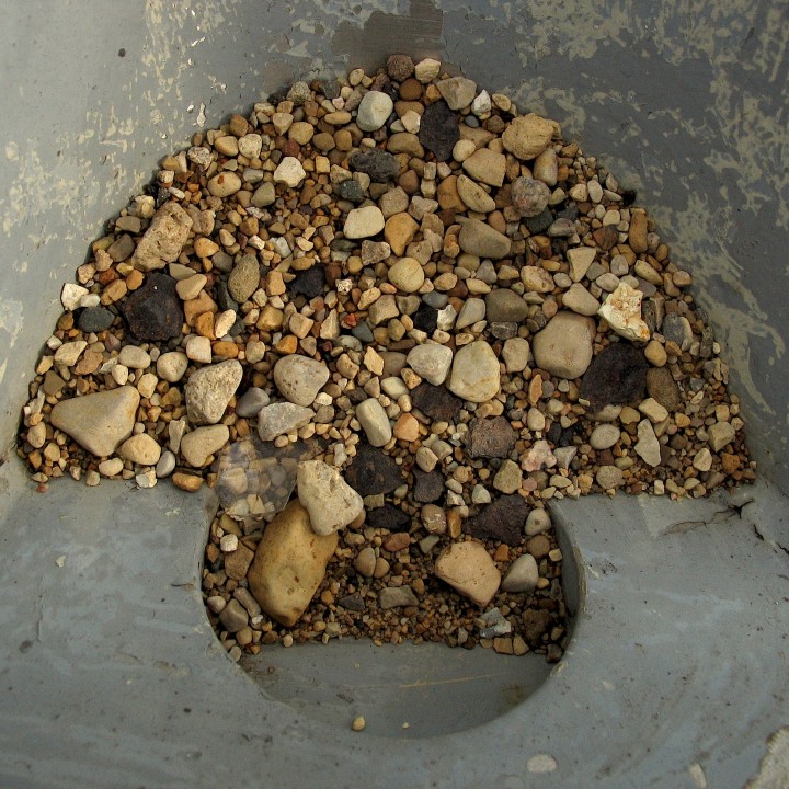 A pile of stones on concrete
